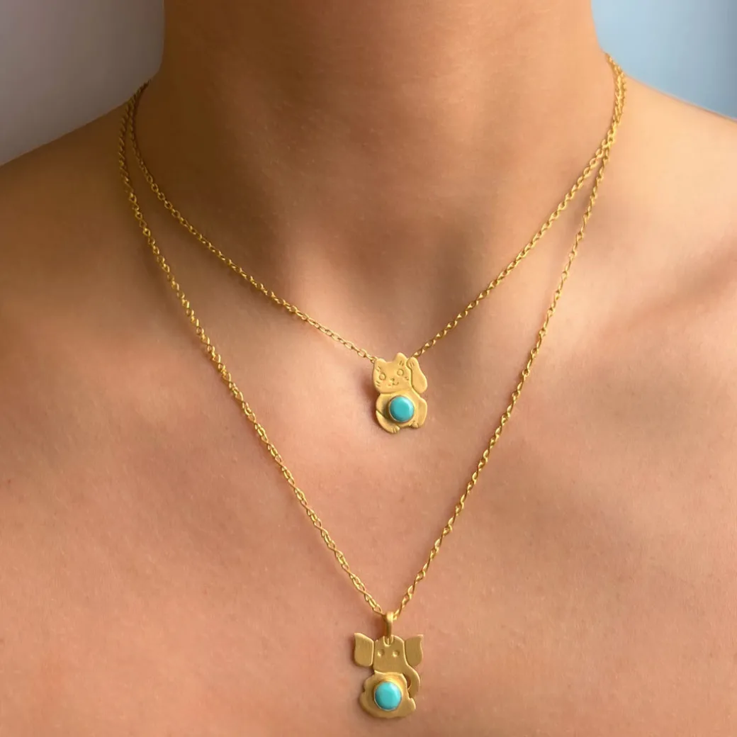 pendentif_maneki_neko_tur_1.webp Pendentif Maneki Neko Turquoise